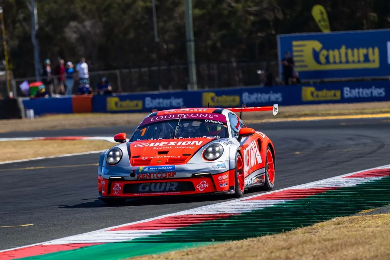 The Dexion Porsche 911 GT3 Cup car rounding a corner at The Bend